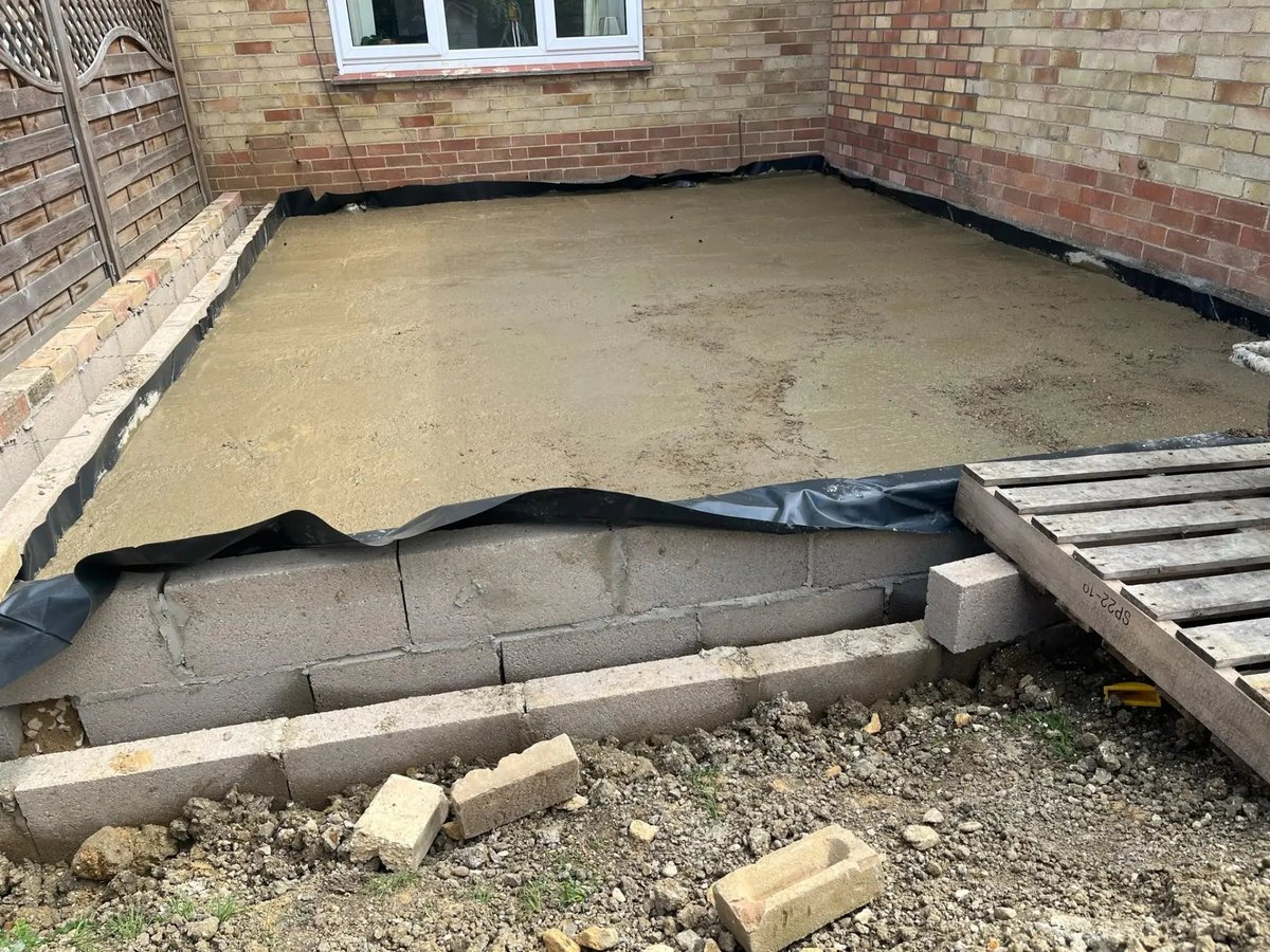 Damp-proof membrane and poured concrete slab for a rear extension, New Road, Warboys