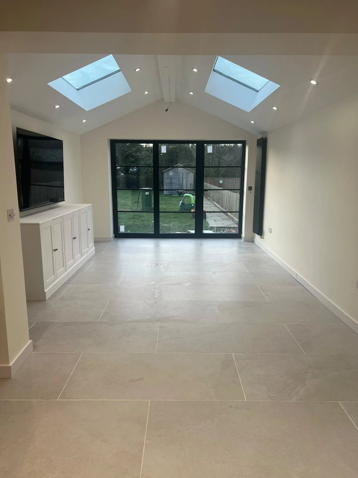 Completed extension interior with vaulted ceiling, rooflights and Crittall-style doors, Warboys