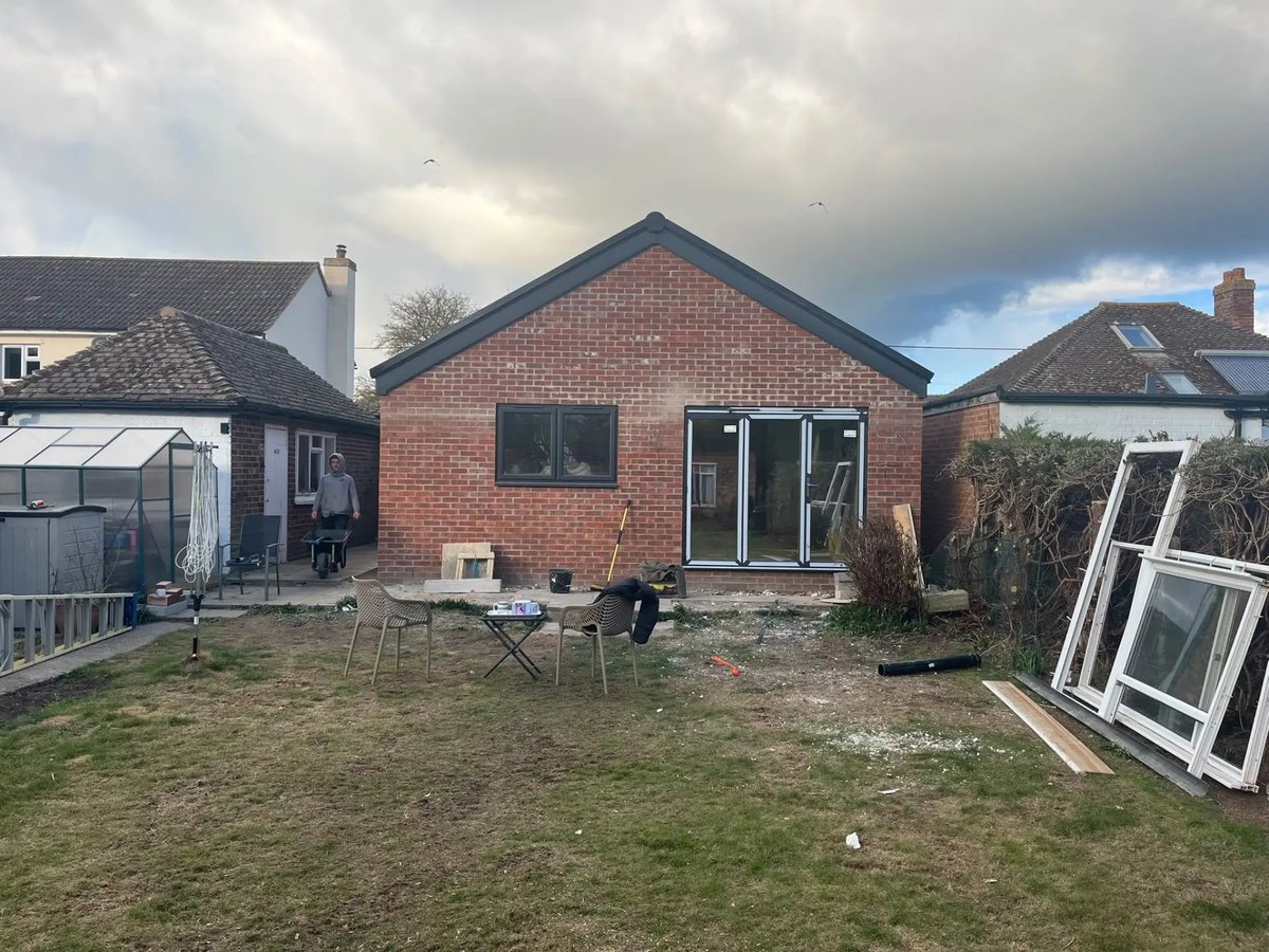 Completed brick gable extension with bifold doors to the garden, Wyton