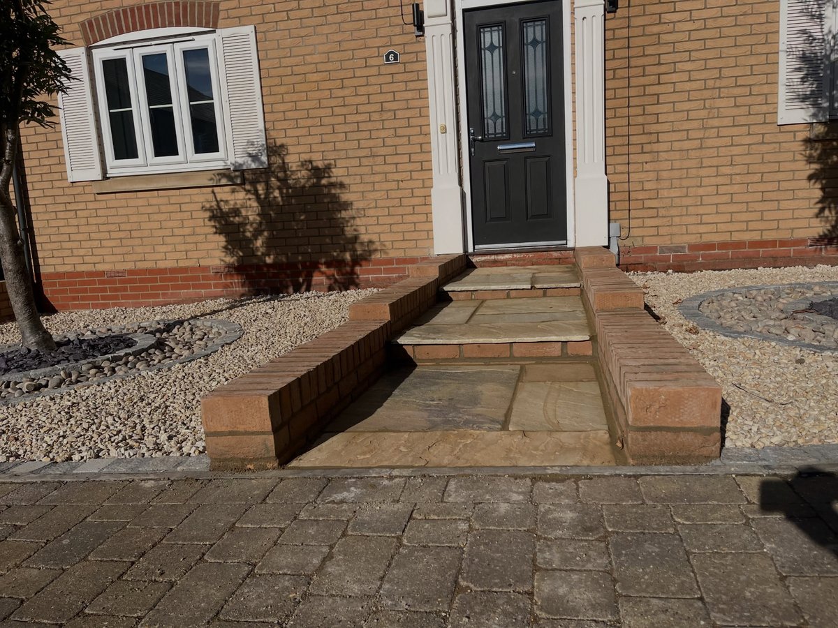 Front garden renovation completed with walls, paving and planting scheme