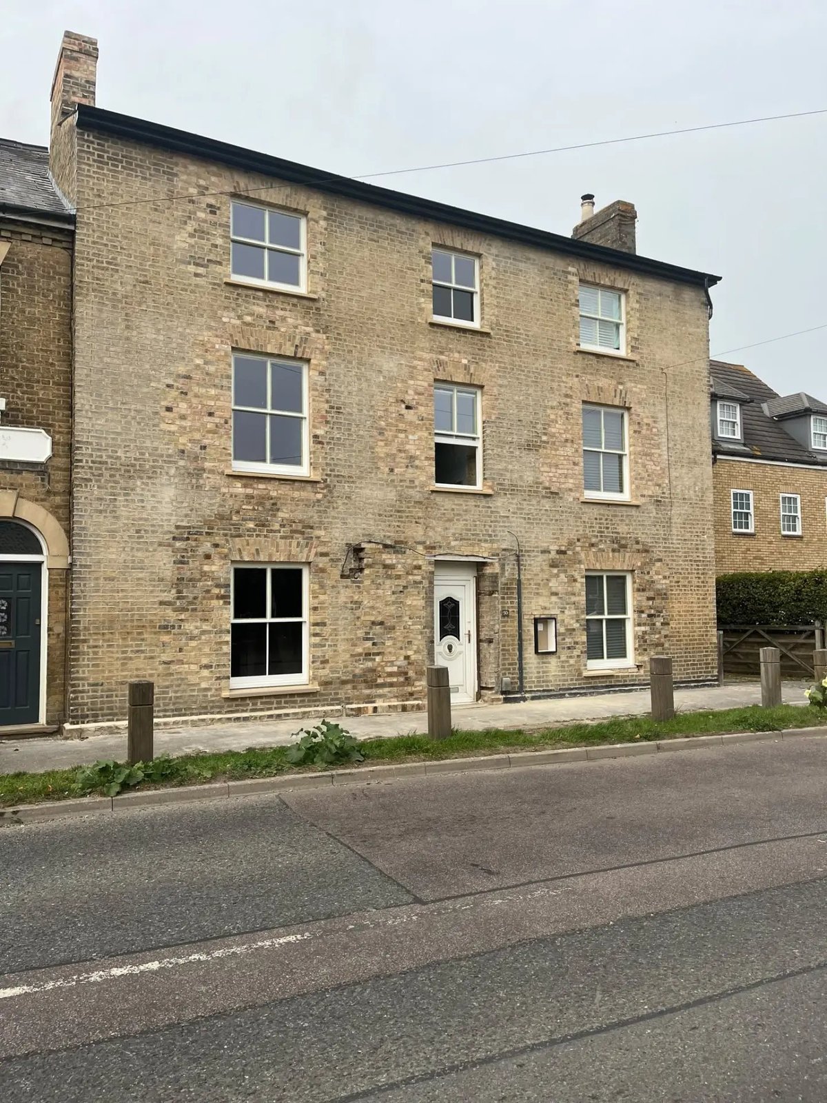 Completed front elevation after brick repairs, new sash windows and fresh hard standing, Willingham