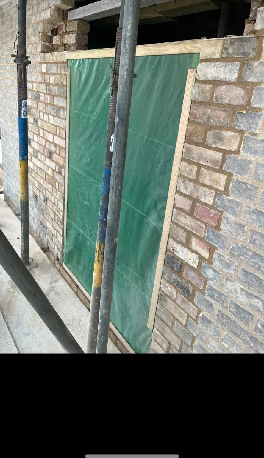 Temporary propping and needling while a new structural opening is formed, Willingham