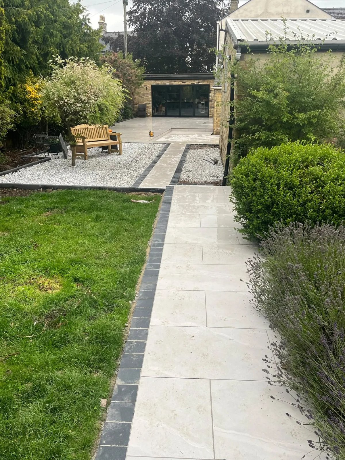 Porcelain path with slate edging leading through the new garden, High Street Warboys