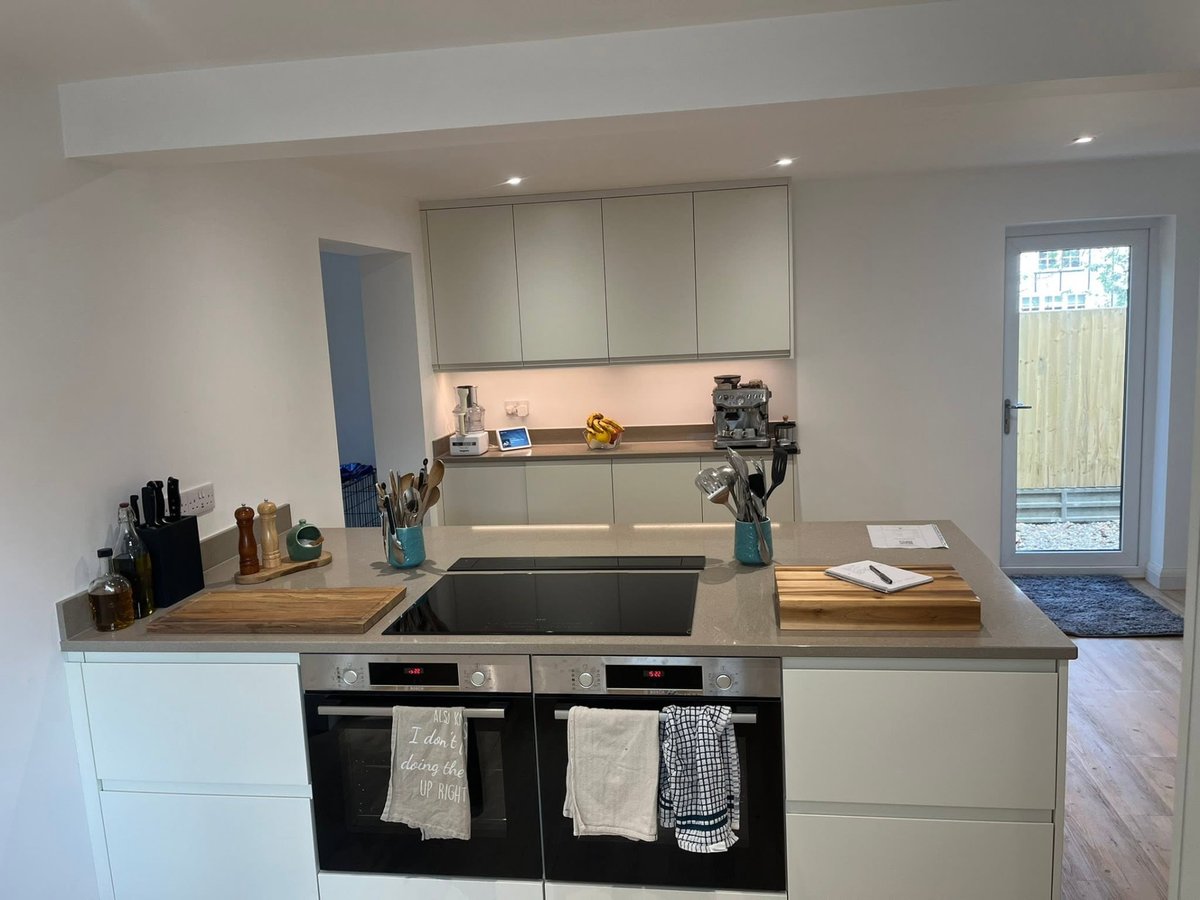 Completed kitchen renovation with island and integrated appliances, St Neots