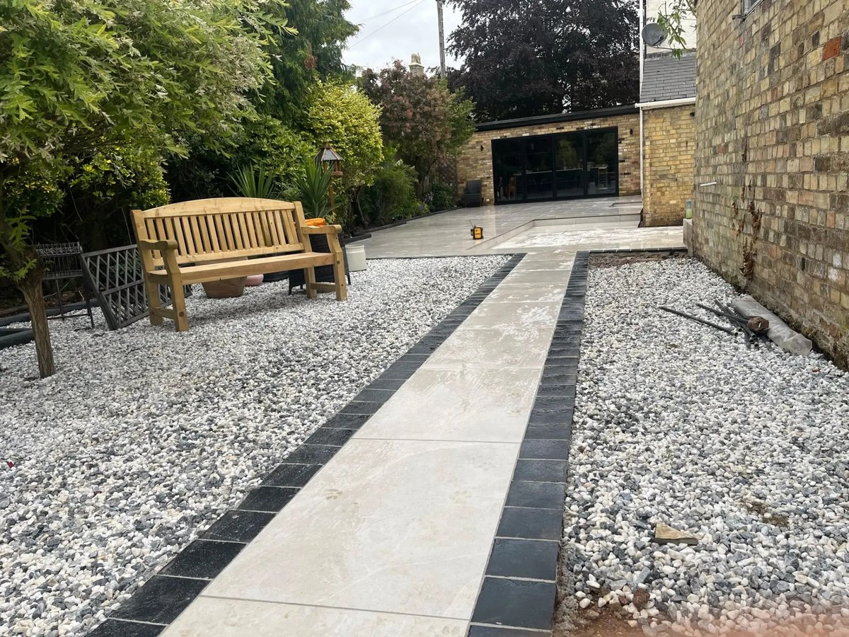 Gravel garden with porcelain path and seating area, High Street Warboys