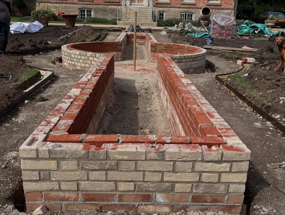 Brick water feature structure taking shape during landscaping works