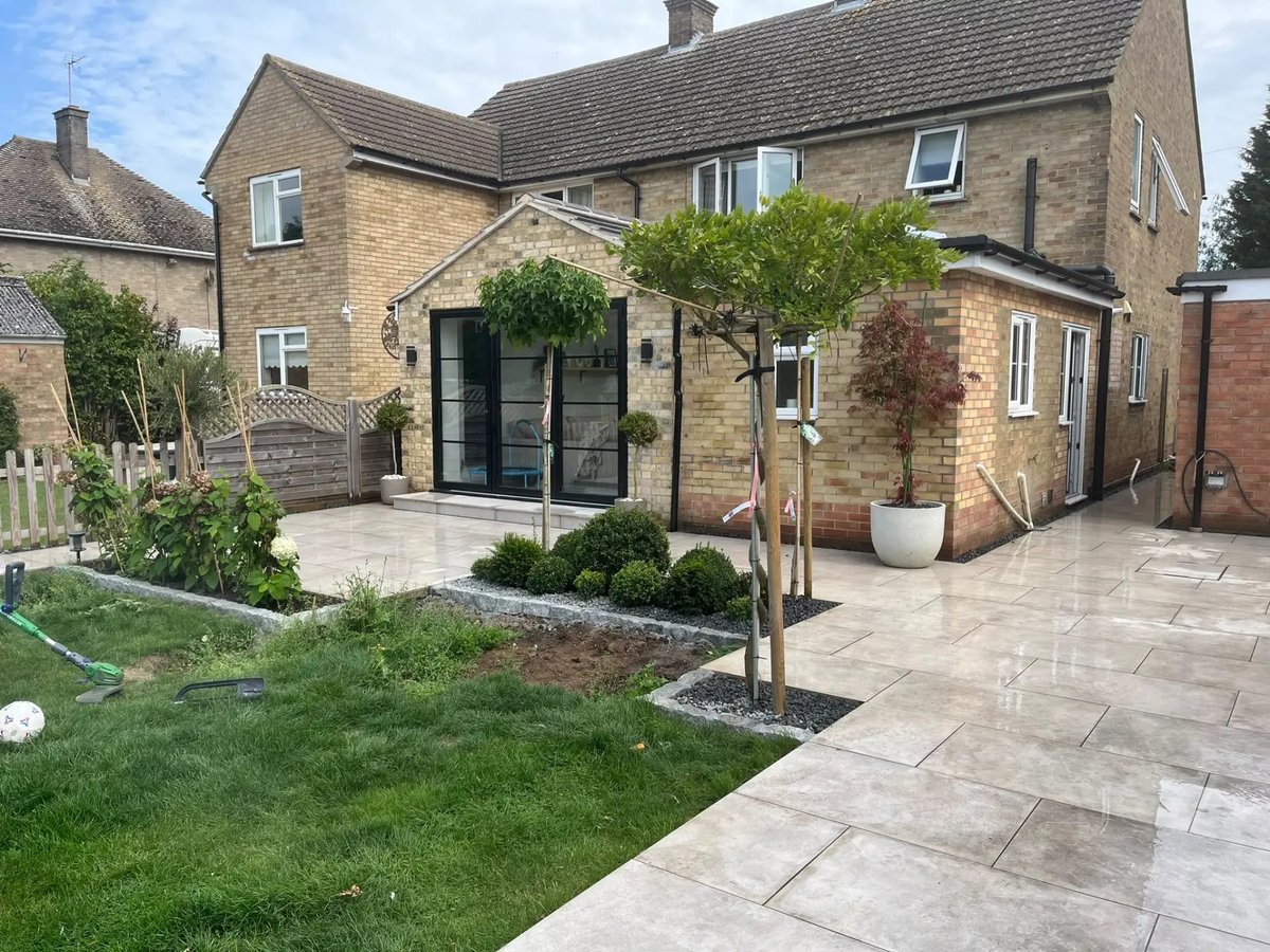 Completed extension, patio and landscaped garden from the rear of the house, Warboys