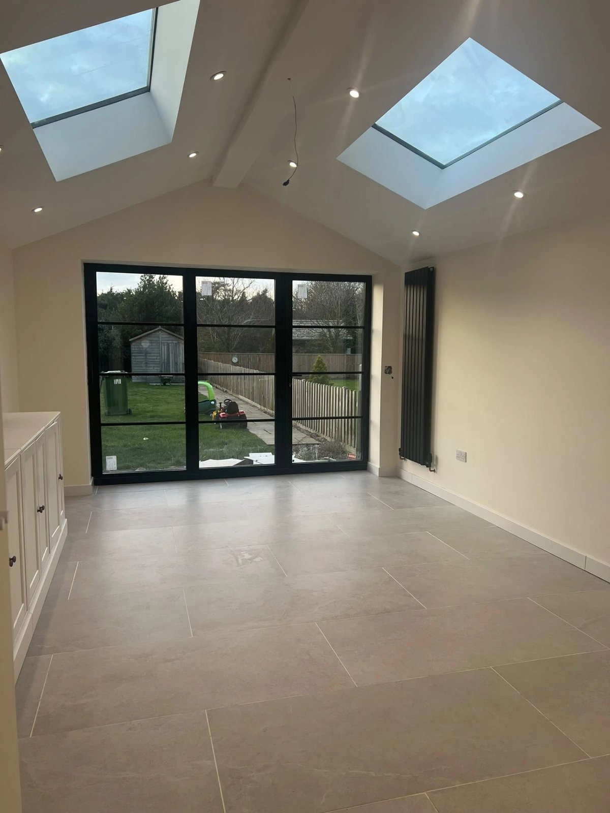 Vaulted extension with twin rooflights, vertical radiator and glazed garden doors, Warboys