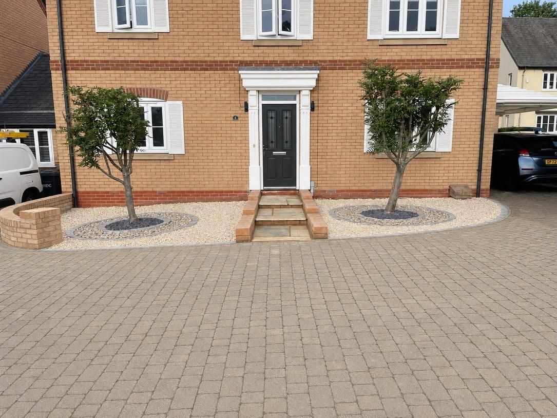 Front garden landscaping with new paving, planting and low brick walls